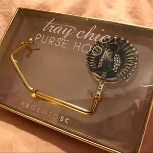 Purse hook hanger for table handbag.